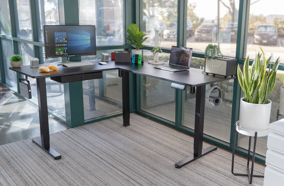 The Best Standing Desks 2025 a corner standing desk with a computer on top of it