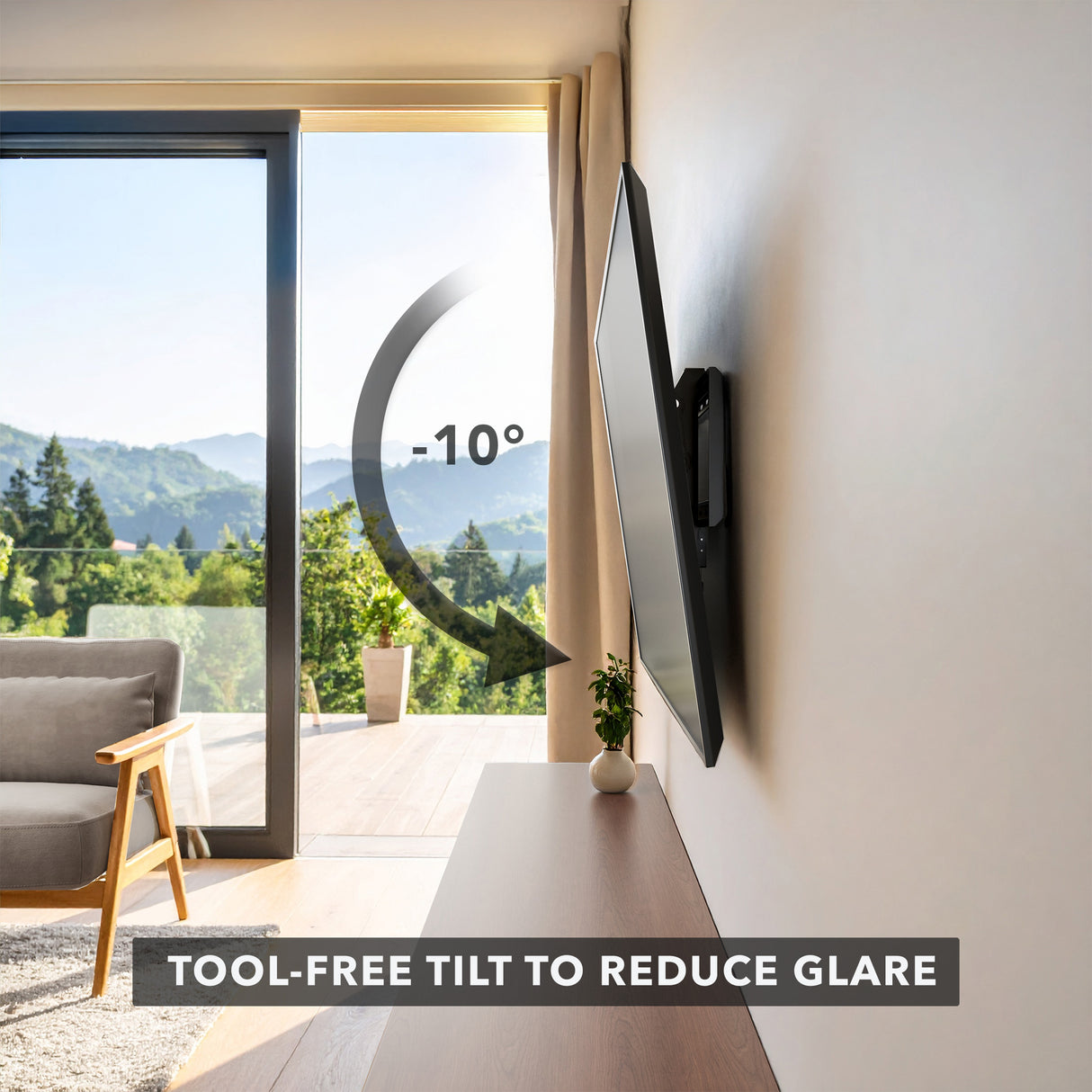 Low Profile Tilt TV Wall Mount Tilted TV Wall Mount in a living room that overlooks the mountains.