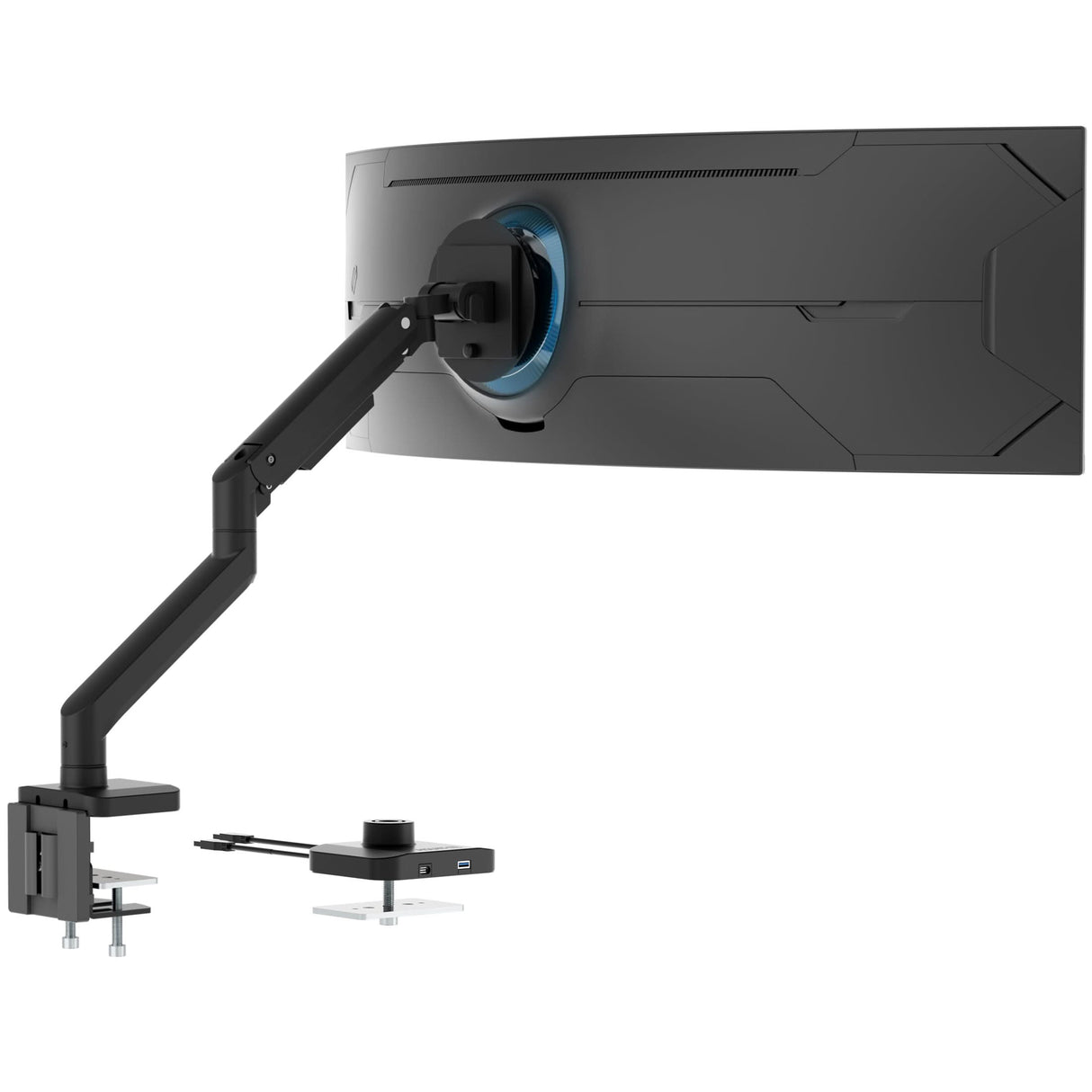 The Mount-It! Heavy-Duty Monitor Mount with Gas Spring Arm holds a curved widescreen monitor, shown from the back with tidy cable management, clamp attachment, and a compact rectangular accessory featuring ports and a mounting bracket.