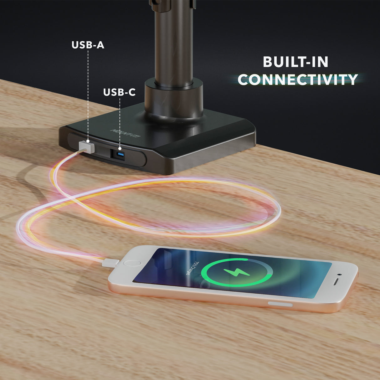 Triple Monitor Mount with Gas Spring Arms and USB Ports Close-up of the base of the Triple Monitor Mount with Gas Spring Arms and USB Ports showing integrated USB-A and USB-C ports charging a smartphone on a wooden desk surface, highlighting built-in connectivity and sleek black design.