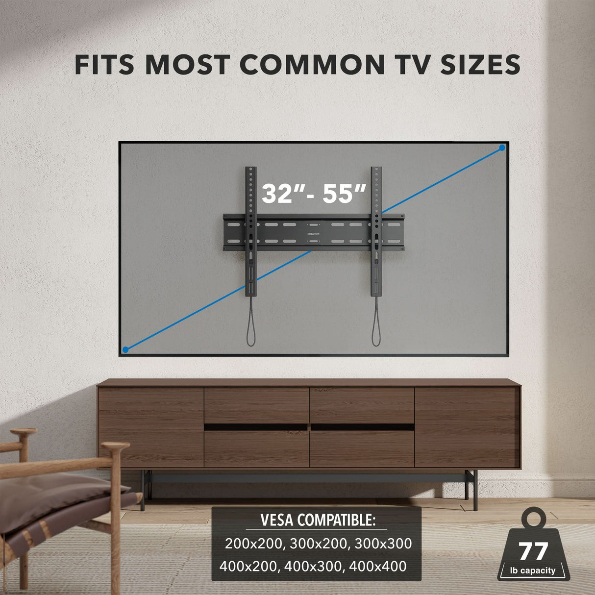 Low Profile Slim TV Wall Mount Fixed TV Bracket installed on a wall above a modern wooden media console, designed to fit most common TV sizes from 32 to 55 inches, showing VESA compatibility from 200x200 to 400x400 mm and supporting up to 77 pounds for a sleek, space-saving setup in a contemporary living room.