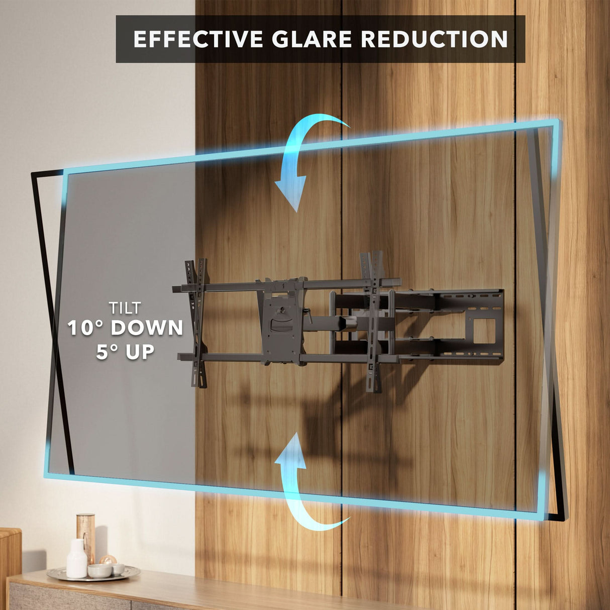 A TV mounted on the Mount-It! Heavy Duty Dual Arm TV Wall Mount with Extra Long Extension tilts 10° downward and 5° upward for glare reduction, shown by blue arrows against a wood-paneled wall.