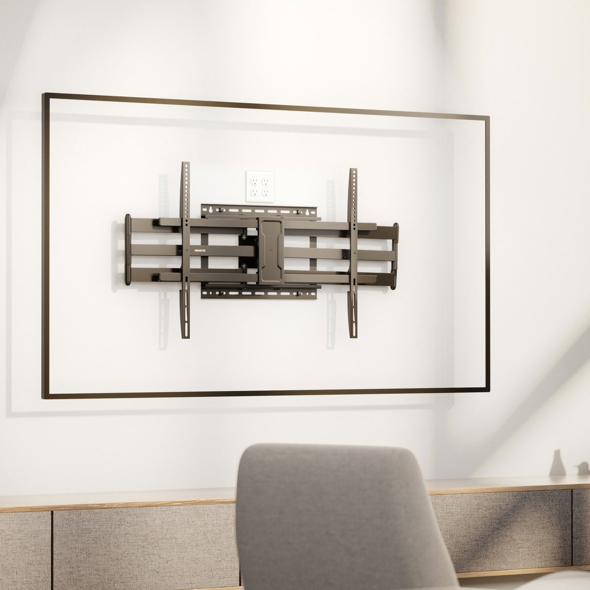 Full Motion TV Wall Mount with Extra Long Extension for 43" - 100" TVs Full Motion TV Wall Mount with Extra Long Extension for 43" - 100" TVs installed on a wall in a modern living space, featuring heavy-duty steel dual arms designed for secure support, adjustable swivel and tilt for optimal viewing angles, and a sleek retractable design that keeps the TV close to the wall for a clean, stylish look above a low cabinet.