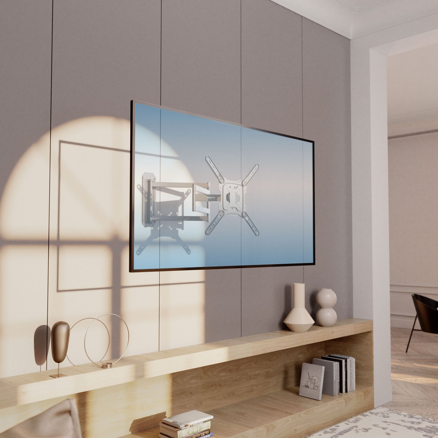 Modern living room scene showing a Full Motion TV Wall Mount with Extra Long Extension for 23"-65" TVs installed on a neutral gray wall above a wooden shelf with decorative items and books, illustrating the mount's sturdy steel construction and flexible positioning capabilities for optimal viewing angles and corner placement.