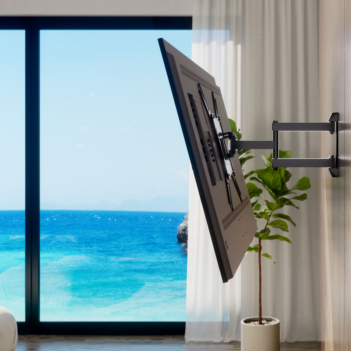 A flat-screen TV is mounted on the Mount-It! Full Motion TV Wall Mount, angled toward a bright room with ocean views. A potted plant sits near the window with white curtains and blue sky outside.