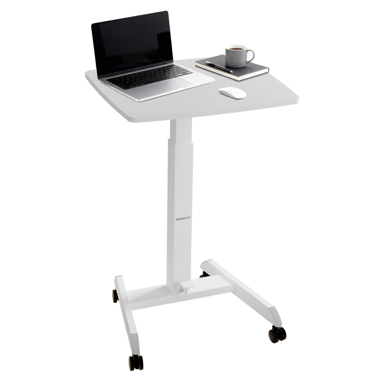 The Mount-It! Height Adjustable Rolling Laptop Desk in white features an ergonomic sit-stand workstation design and four wheels for easy mobility, shown with a laptop, mouse, notebook, pen, and coffee cup on top.