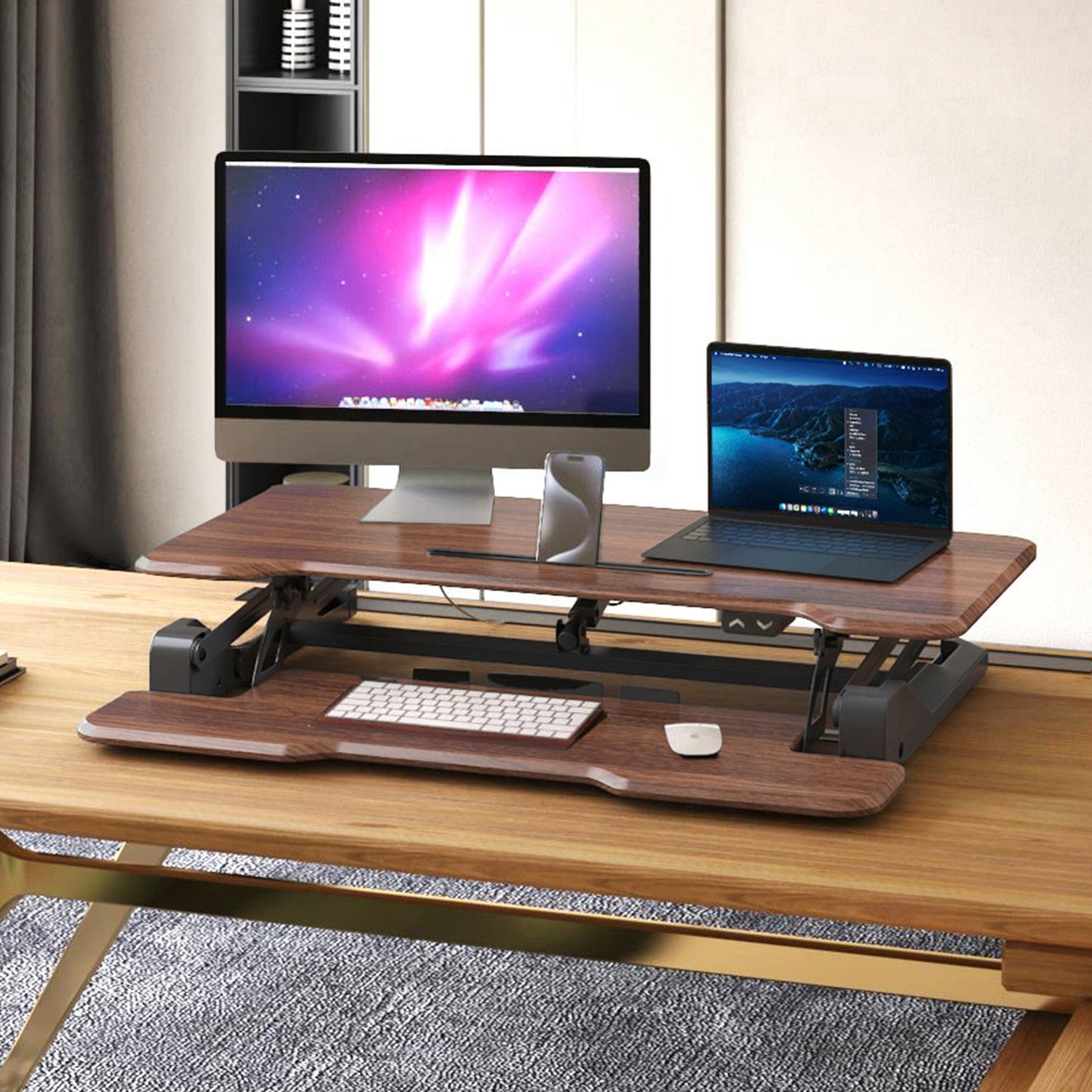 Electric Standing Desk Converter with 38" Desktop - MI-8011 - Dark Walnut Woodgrain - In use with monitor and laptop on desk - lowered position