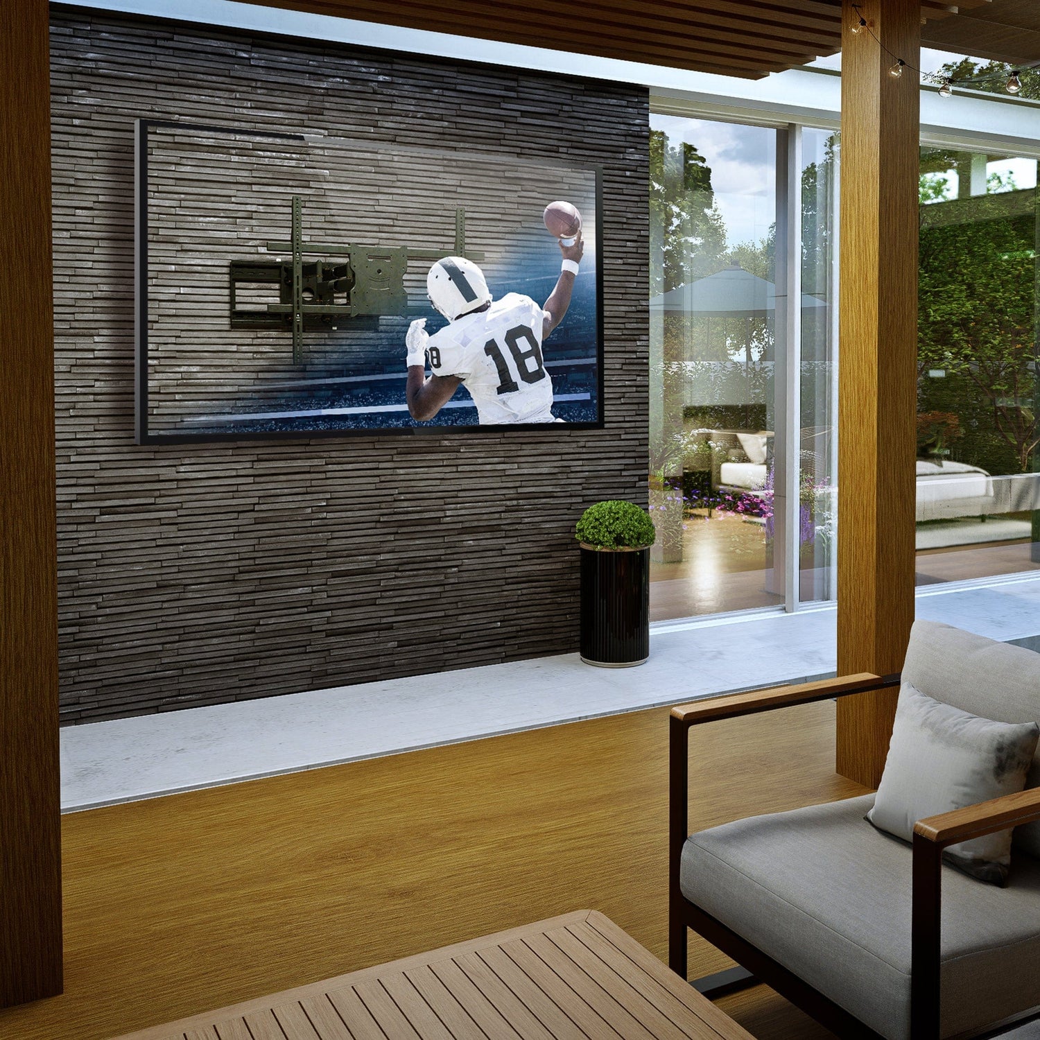 Full Motion Weatherproof TV Wall Mount The Beast - TV mounted on patio wall