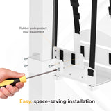 A hand uses a screwdriver to install the Mount-It! MedHub CPU Holder, a white metal mount with adjustable straps and protective rubber pads. Text reads: Easy, space-saving installation.