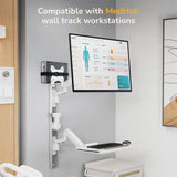 A modern room features a wall-mounted workstation with a large screen showing health data, keyboard tray, mouse, and the Mount-It! MedHub Mini CPU Holder. Text: Compatible with MedHub wall track workstations.