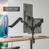 Triple Monitor Mount with Gas Spring Arms securely holding three screens on a desk, showcasing adjustable gas spring arms for smooth height, tilt, swivel, and rotation adjustments, designed to optimize productivity and create an organized workspace with a sleek, sturdy clamp-on steel construction.