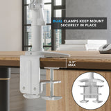 Close-up of the white dual clamp system of the Triple Monitor Mount with Gas Spring Arms securing the mount firmly to a wooden desk edge, demonstrating maximum clamping capacity of 3.3 inches for stable support and workspace organization.