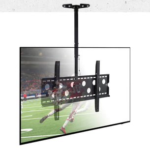 A Mount-It! Full-Motion TV Ceiling Mount for 42-90” screens securely hangs a flat-screen TV from the ceiling, displaying a football game with players on a green field and a cheering stadium crowd in the background.