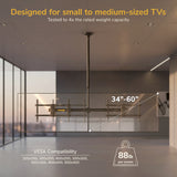 The Mount-It! Dual TV Ceiling Mount with Long Pole securely holds four 34”-60” screens (up to 88 lb each) with VESA compatibility and adjustable drop, perfect for modern commercial spaces with warm lighting and expansive windows.