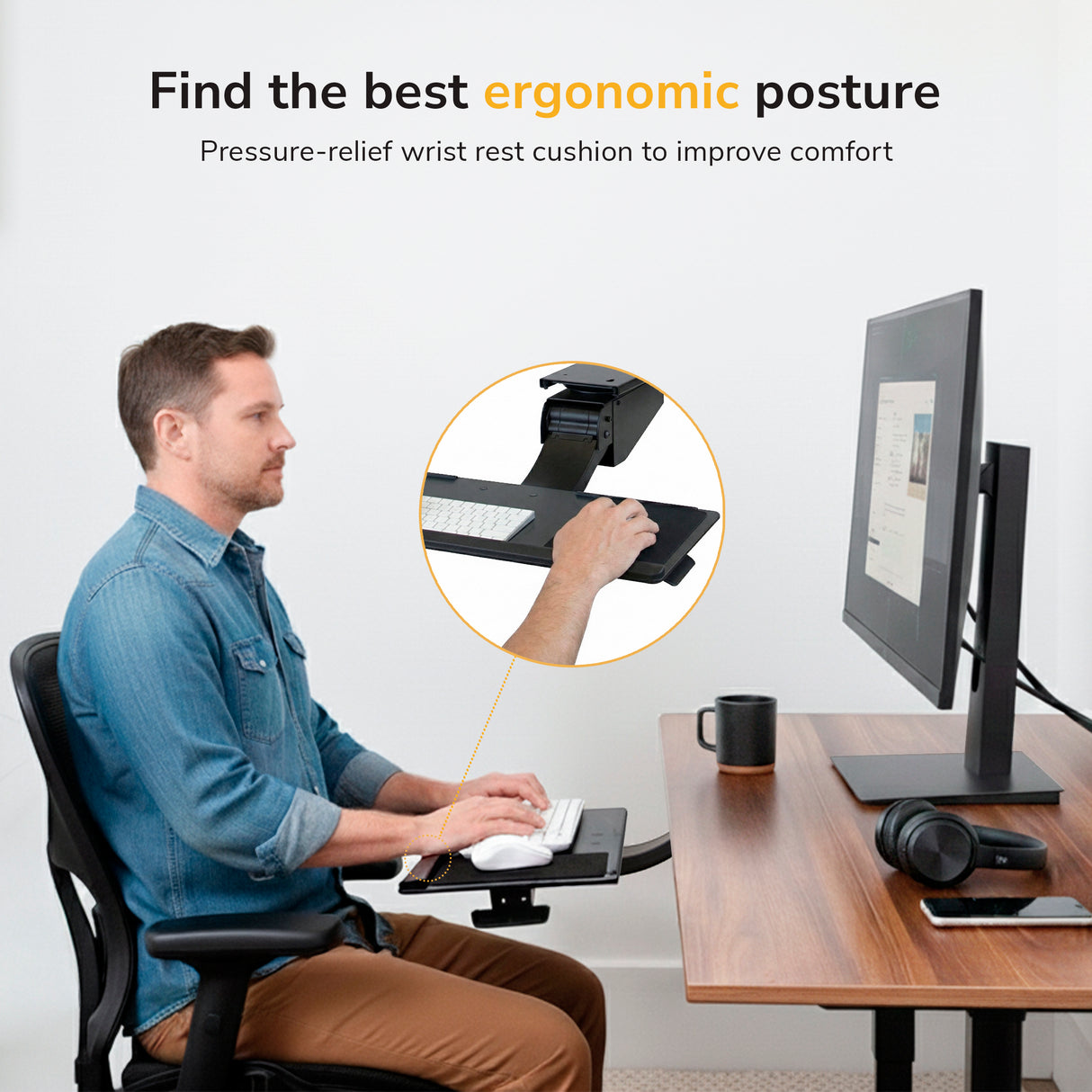 A man uses the Mount-It! Standing Keyboard and Mouse Platform With Ergonomic Wrist Rest Pad, sitting with proper posture. Text highlights how this under desk tray increases comfort and encourages healthy work habits.