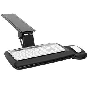 Black adjustable desk setup with keyboard tray, keyboard, mouse, and mouse pad on a white background
