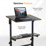 The Mount-It! Mobile Lectern Stand Up Desk features a spacious 23.6" x 15.8" desktop for your laptop and a lower 23.6"-wide shelf for essentials, offering versatile sit-stand workstation benefits on a sleek, light background.