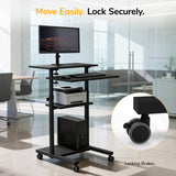 The Mount-It! Rolling Computer Work Station with Monitor Mount holds a monitor, keyboard, printer, and computer tower. An inset shows a locking brake on a desk wheel. Text reads: Move Easily. Lock Securely.