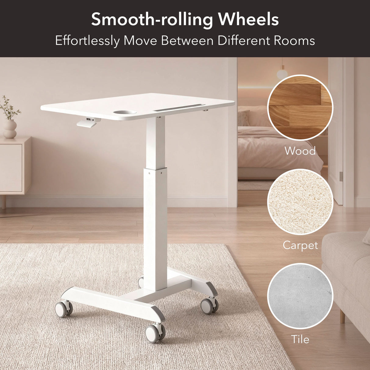 The Mount-It! Sit-Stand Mobile Laptop Cart in white is displayed in a living room, showcasing its smooth-rolling wheels for easy mobility on wood, carpet, and tile—ideal as a versatile mobile workstation.