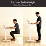 Split image: man uses the Mount-It! Sit-Stand Mobile Laptop Cart, sitting on the left and standing on the right. Text above says, "Find Your Perfect Height—Sit or Stand." White, height-adjustable desk with wheels sits on a wood floor.