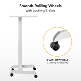 The Mount-It! Height Adjustable Rolling Laptop Desk features a white finish and four black caster wheels, two with locking brakes. Close-up inset shows a locking wheel. Text: “Smooth-Rolling Wheels with Locking Brakes. 4 caster wheels.”.