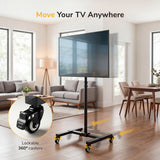 A Mount-It! Adjustable Mobile TV Stand supports a flat-screen TV in a modern living room. Text says, Move Your TV Anywhere. A close-up highlights the stand’s smooth-rolling locking casters and arrows show its easy mobility.