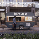 Anti-Rust RV TV Wall Mount installed on a food truck with person looking at the menu